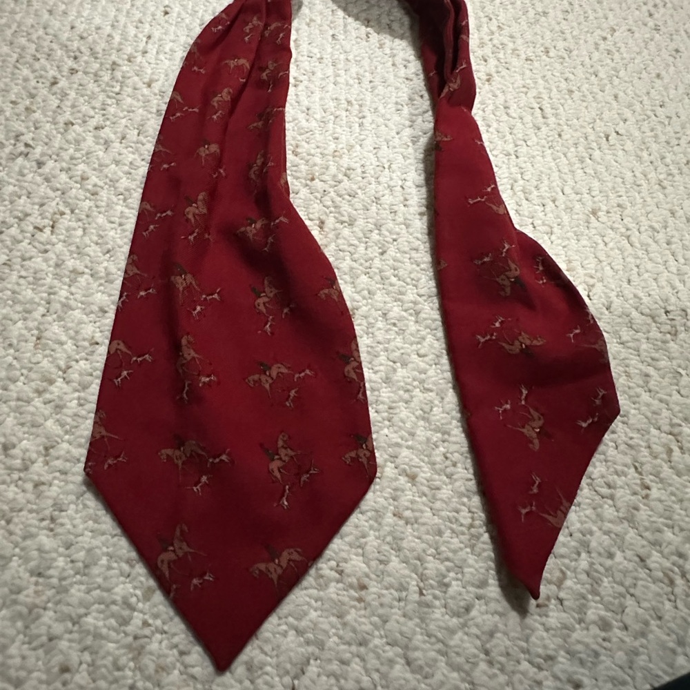 Horses and dog red tie? Elys